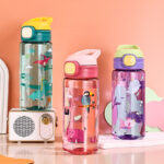 Portable 600ml Leak-Proof Water Bottle for Kids Cartoon-Design Plastic Food Grade Material with Safe Lid Straw